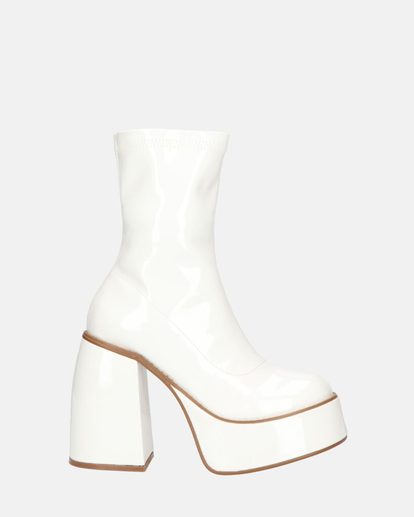 MYA - platform ankle boots with high heels in white glassy